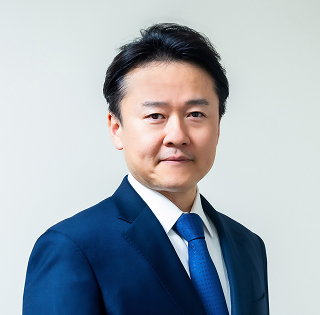 取締役副社長兼執行役員コーポレート担当兼関連事業担当<br/>中村 壽一